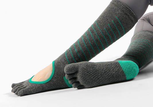 Why Grip Socks Are Essential for Yoga and Pilates
