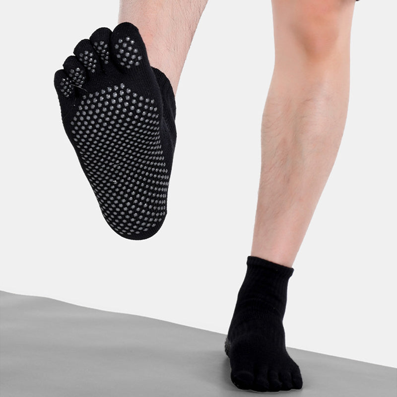 Non-slip silicone grip bottom on men’s yoga socks for stability
