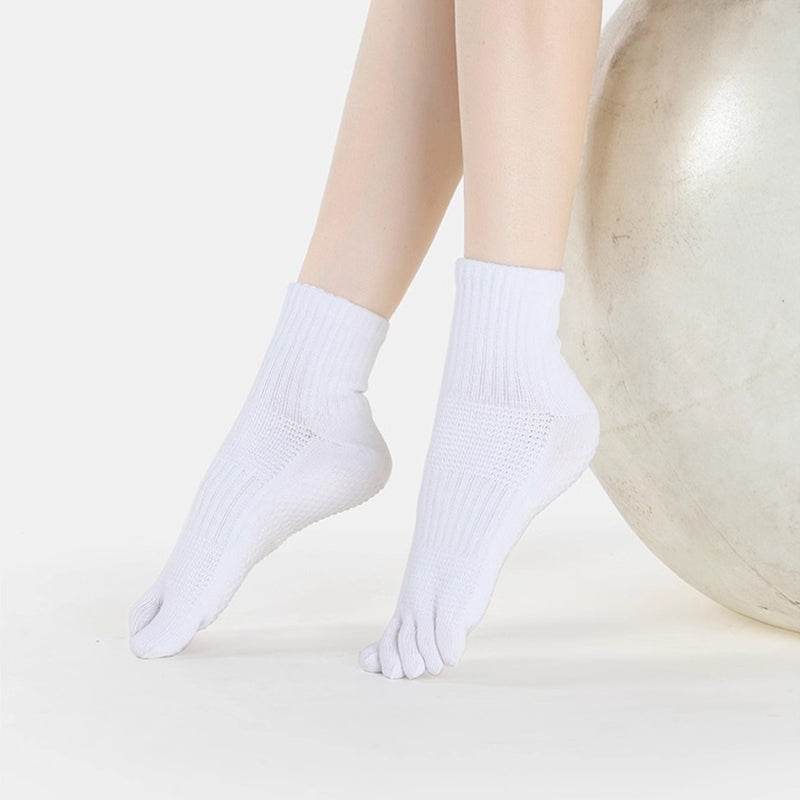 Close-up of arch support zone on five-toe yoga socks