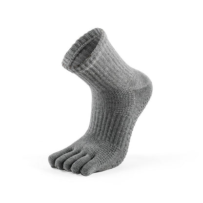 Silicone grip dots on men’s gray five-toe ankle socks