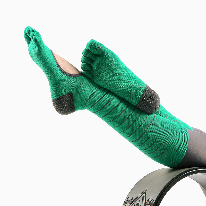 Pilates socks with arch-hugging fit and anti-slip grip

