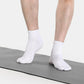 Men wearing five-toe grip socks for yoga and studio exercise